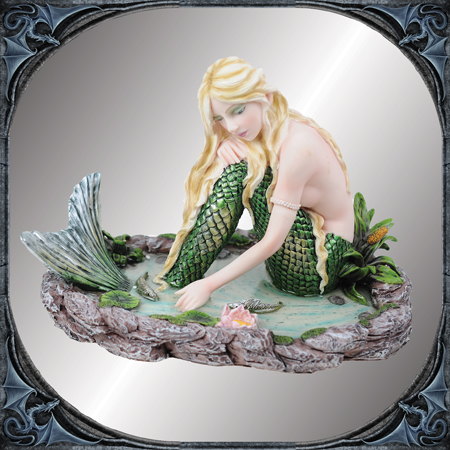 Mermaid in pond
